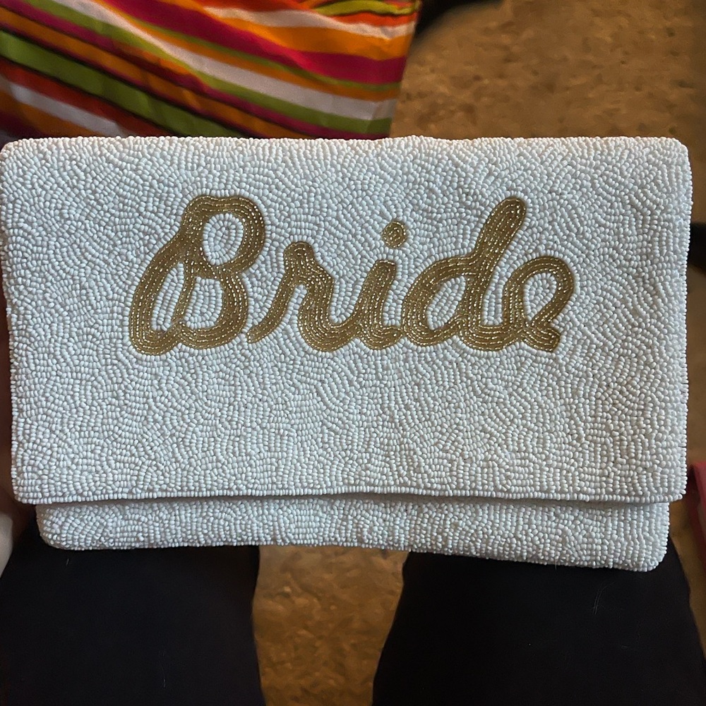 “Bride” clutch with chain
